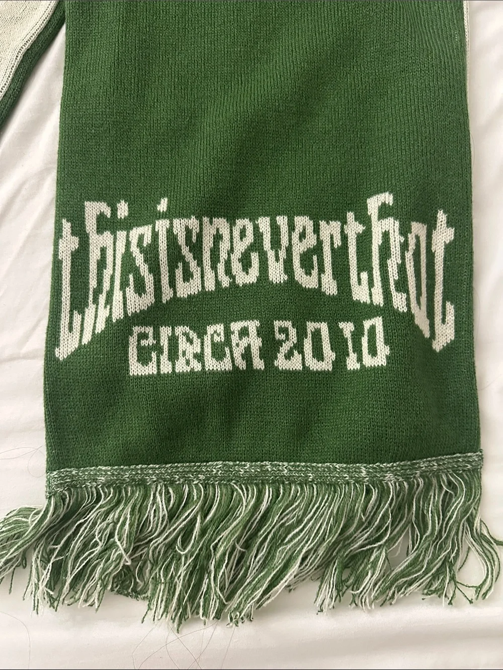 This is never that green beige scarf